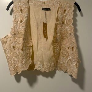 Nasty Gal ivory vest. NEVER WORN. Size M